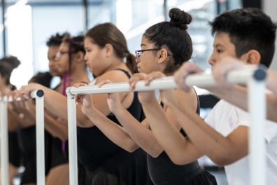 Releve students learn at the barre.