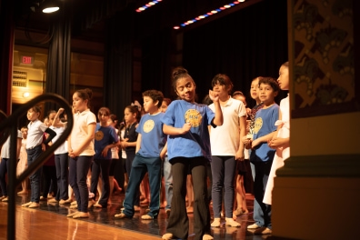 Releve students perform on stage.