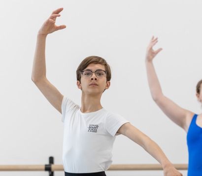 a child and child dancing in a dance studio