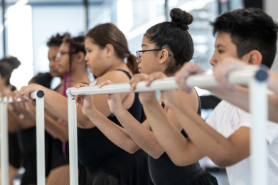Releve students learn at the barre.