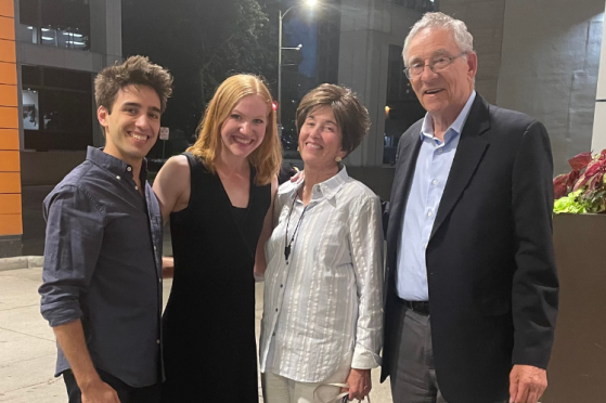 Milwaukee Ballet Company dancer poses for a picture with her sponsors.