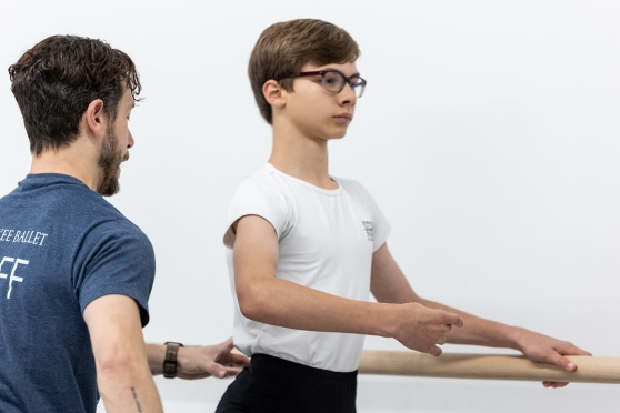 a child receiving feedback in men's class