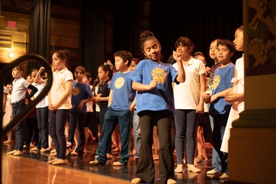 Releve students perform on stage.