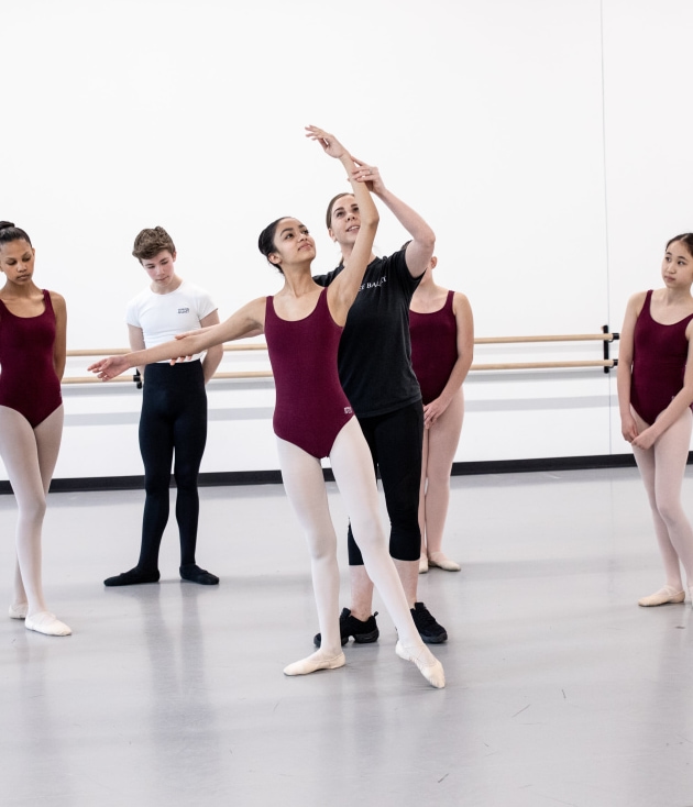 a group of people in ballet clothes