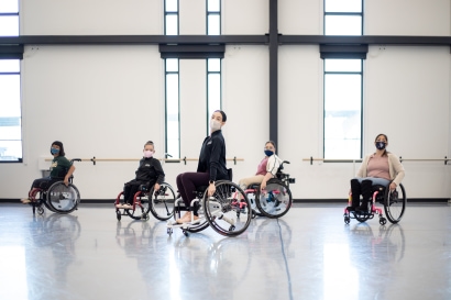 a group of people in wheelchairs